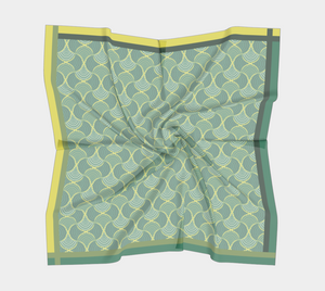 Silk charmeuse scarf with green gold geometric pattern slightly scrunched up 